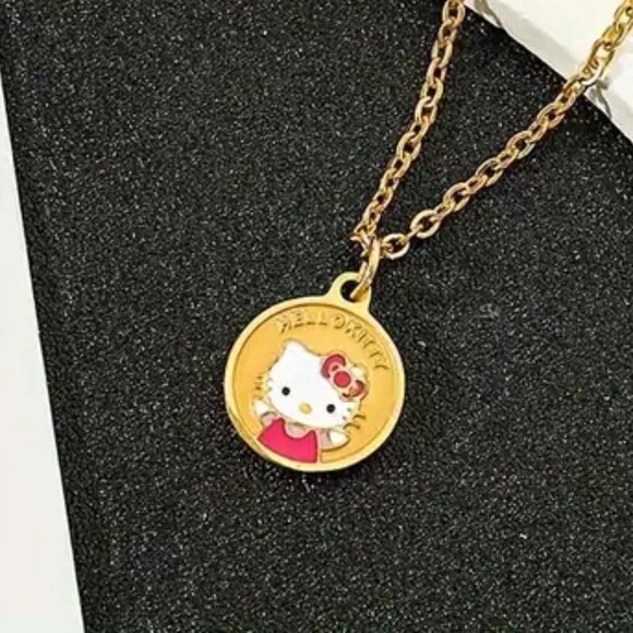 Hello Kitty Jewelry - Gold Plated Hello Kitty Token Necklace